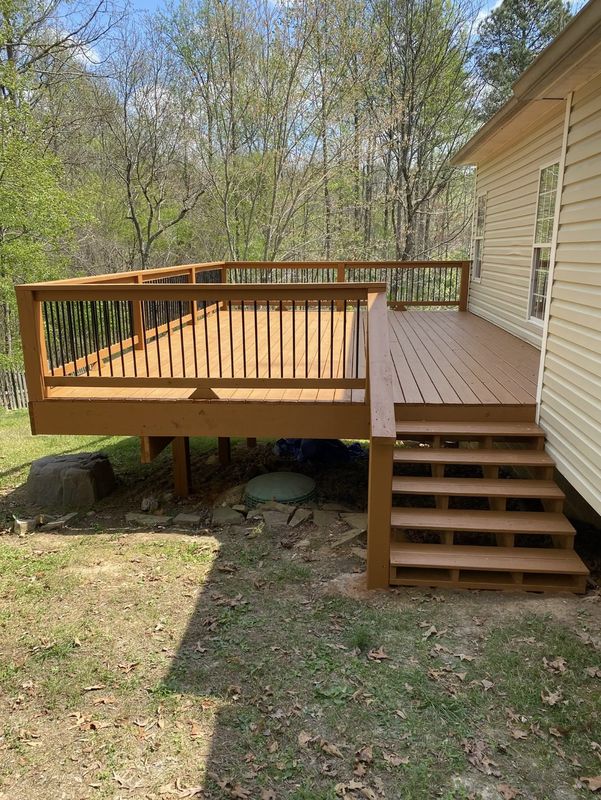 Small deck and stairs stained a cedar tan color